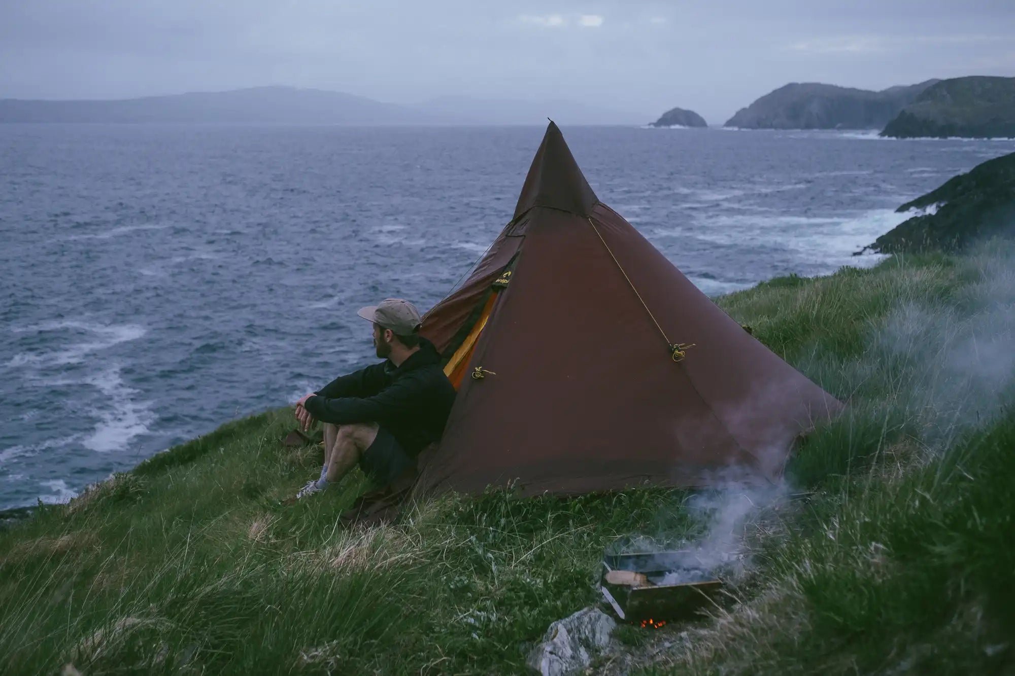 Small adventure camping tent pitched by the sea Olivin 2 light Combo Nordic tipi by Tentipi with Chris McClean