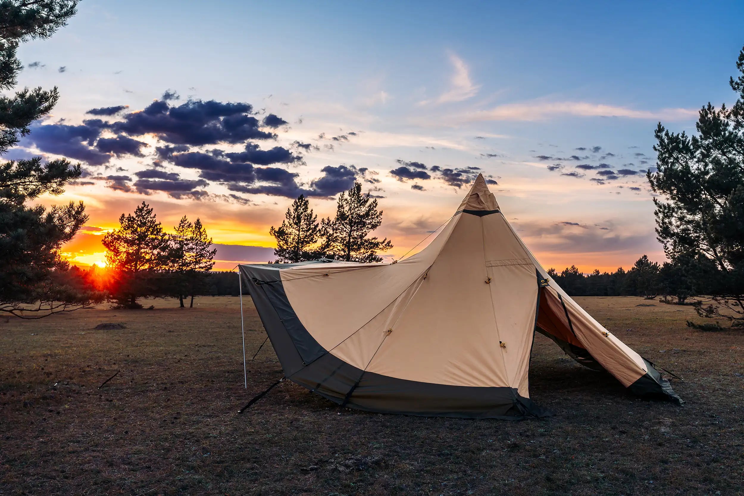 SafirFlex 9 cp canvas tent with raisable walls in sunset