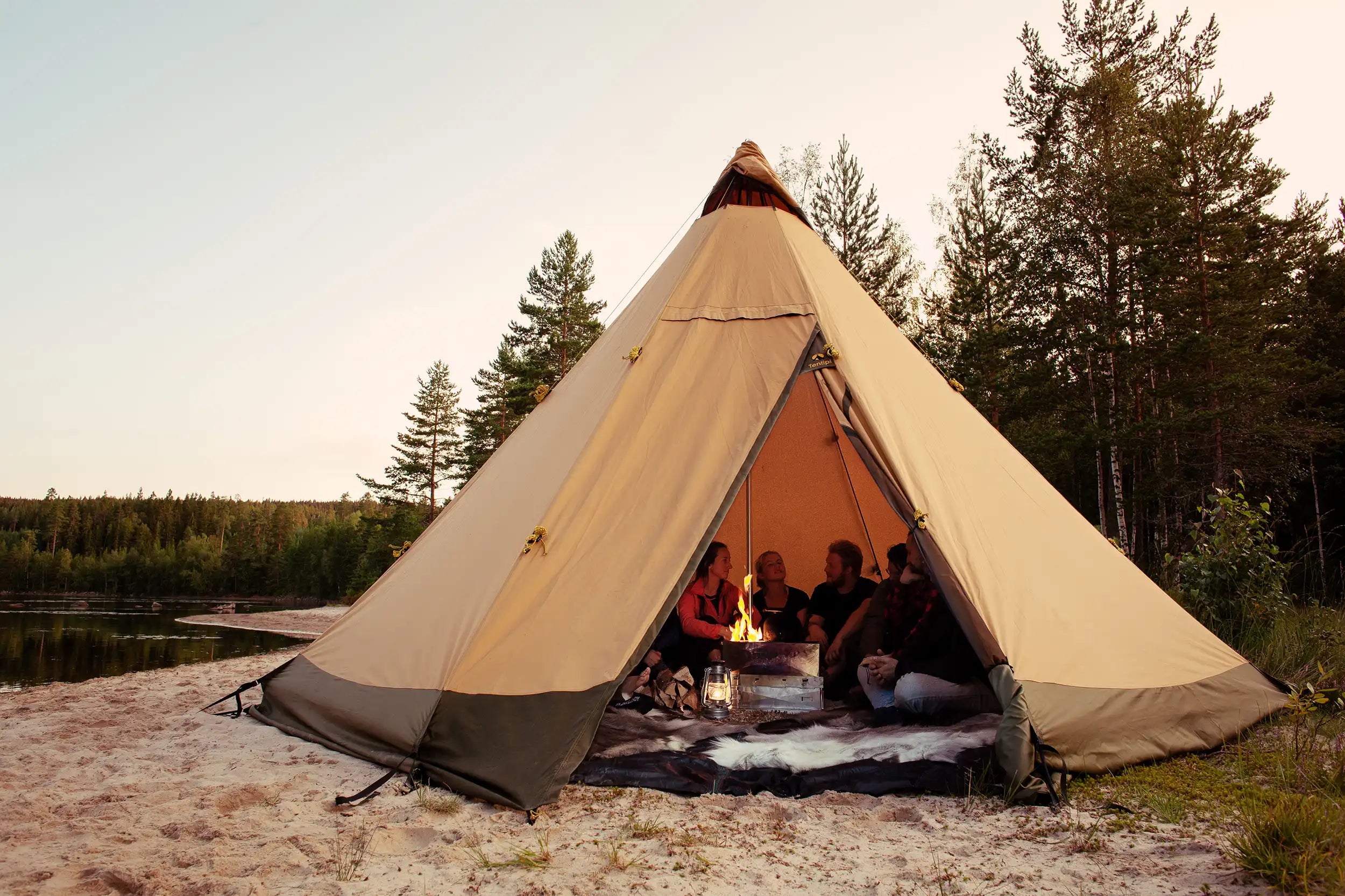 Canvas tents with standing headroom and possibility for open fire or stove friends camping adventure