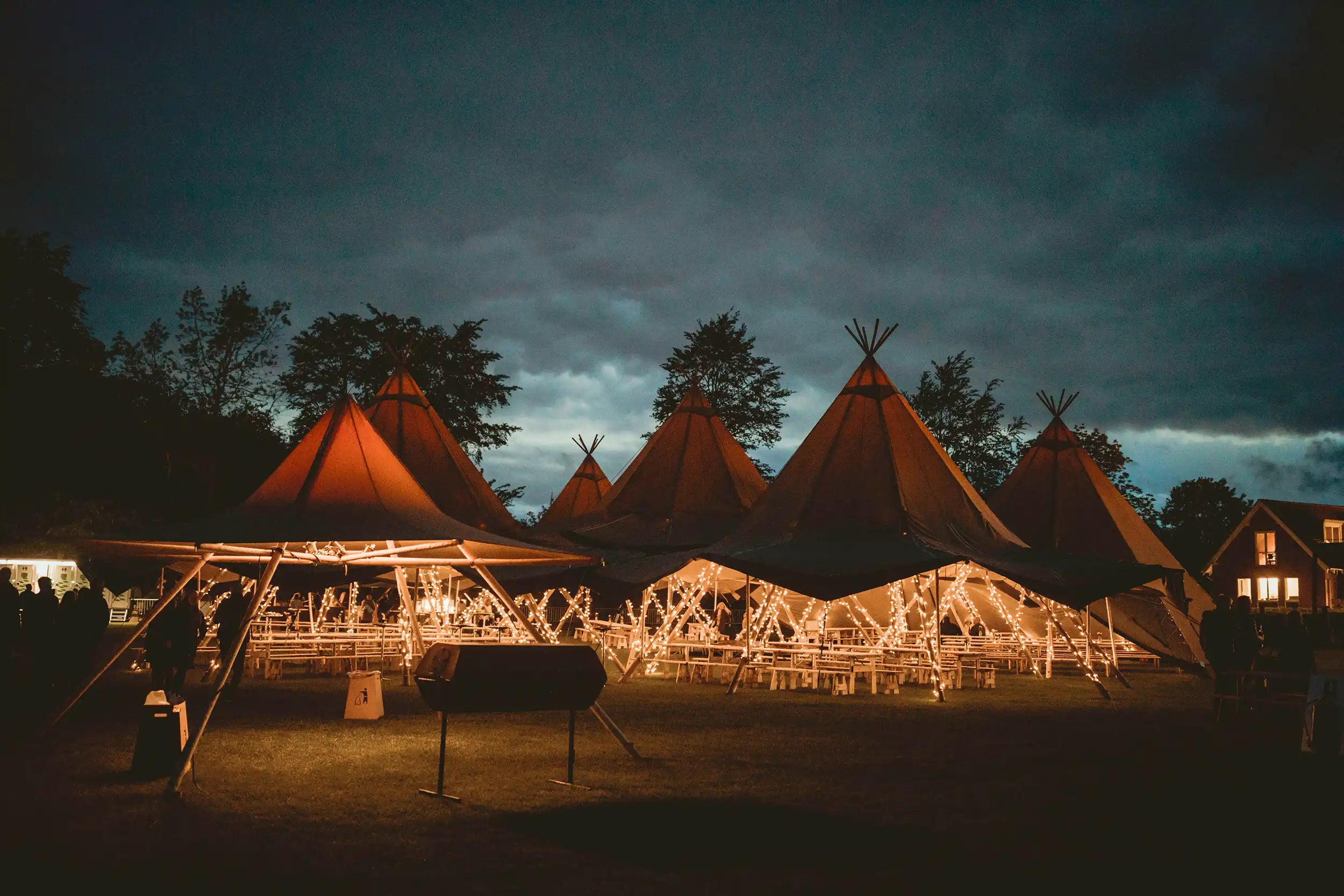 Festival tents with lights and tables for hire rent and sale Tentipi Nordic tipi